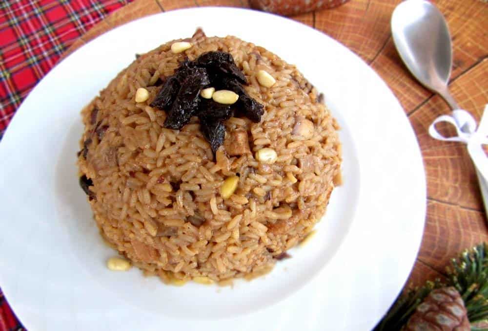 Festive Rice With Wine, Pancetta, Prunes And Pine Nuts